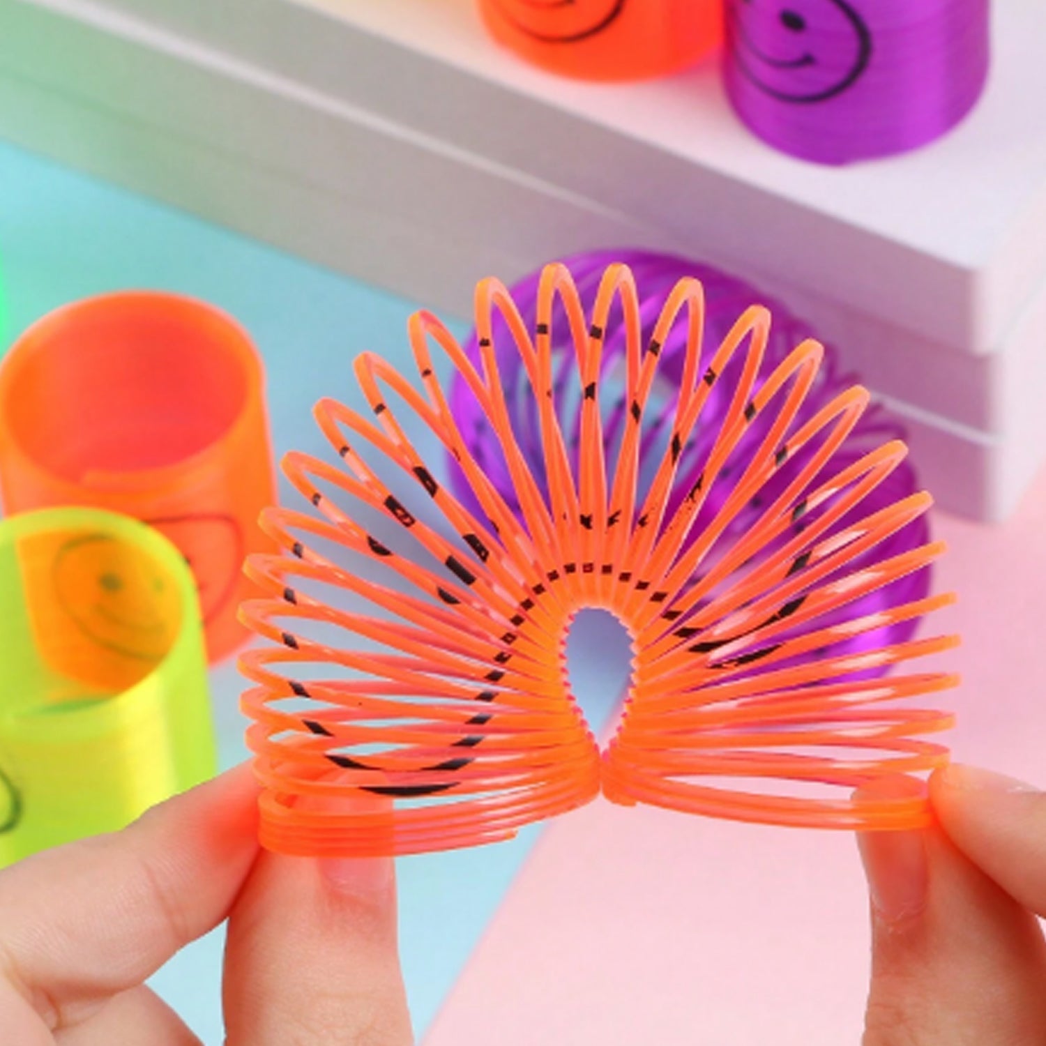 Multicolor Magic Smiley Spring, Spring Toys, Slinky, Slinky Spring Toy, Toy for Kids for Birthdays, Compact and Portable Easy to Carry (12 Pcs Set) Multicolor Magic Smiley Spring, Spring Toys, Slinky, Slinky Spring Toy, Toy for Kids for Birthdays, Compact and Portable Easy to Carry (12 Pcs Set)